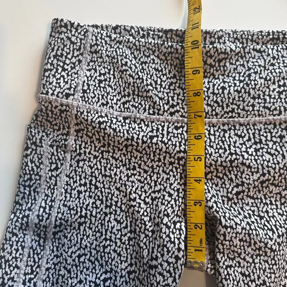 Athleta Ultimate Stash Textured 7/8 Leggings Womens Large Camilla Water Violet